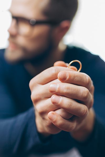 heartbroken man holding a wedding ring rocky river oh