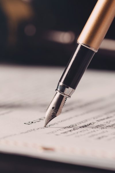 pen close up signing document bay village oh